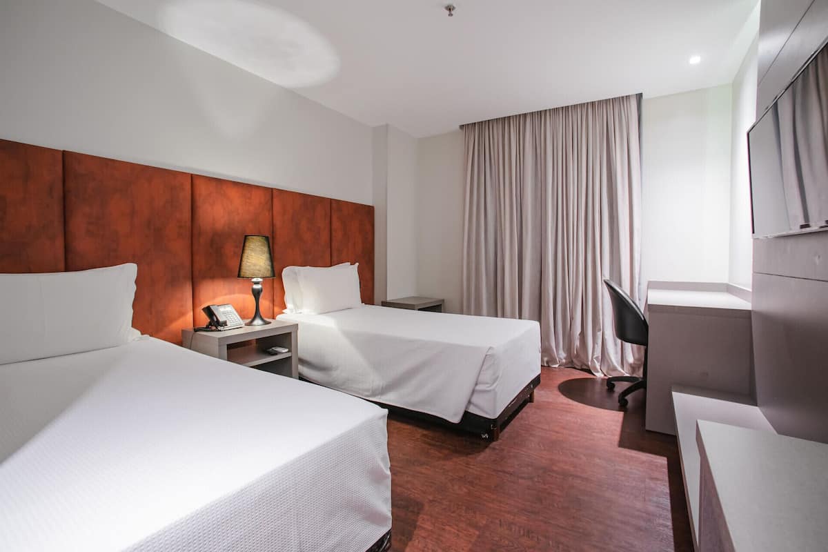 In-room safe, desk, WiFi (free), bed sheets