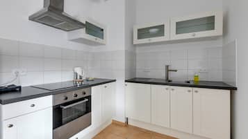 Apartment, 1 Bedroom, Balcony | Private kitchen | Fridge, microwave, stovetop, dishwasher