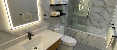 Luxury Room, 2 Queen Beds | Bathroom | Combined shower/bathtub, free toiletries, towels, soap