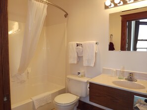 Deluxe Suite, 1 King Bed (Mayor's Office) | Bathroom | Combined shower/bathtub, free toiletries, hair dryer, towels - Town Hall Inn (Lead)