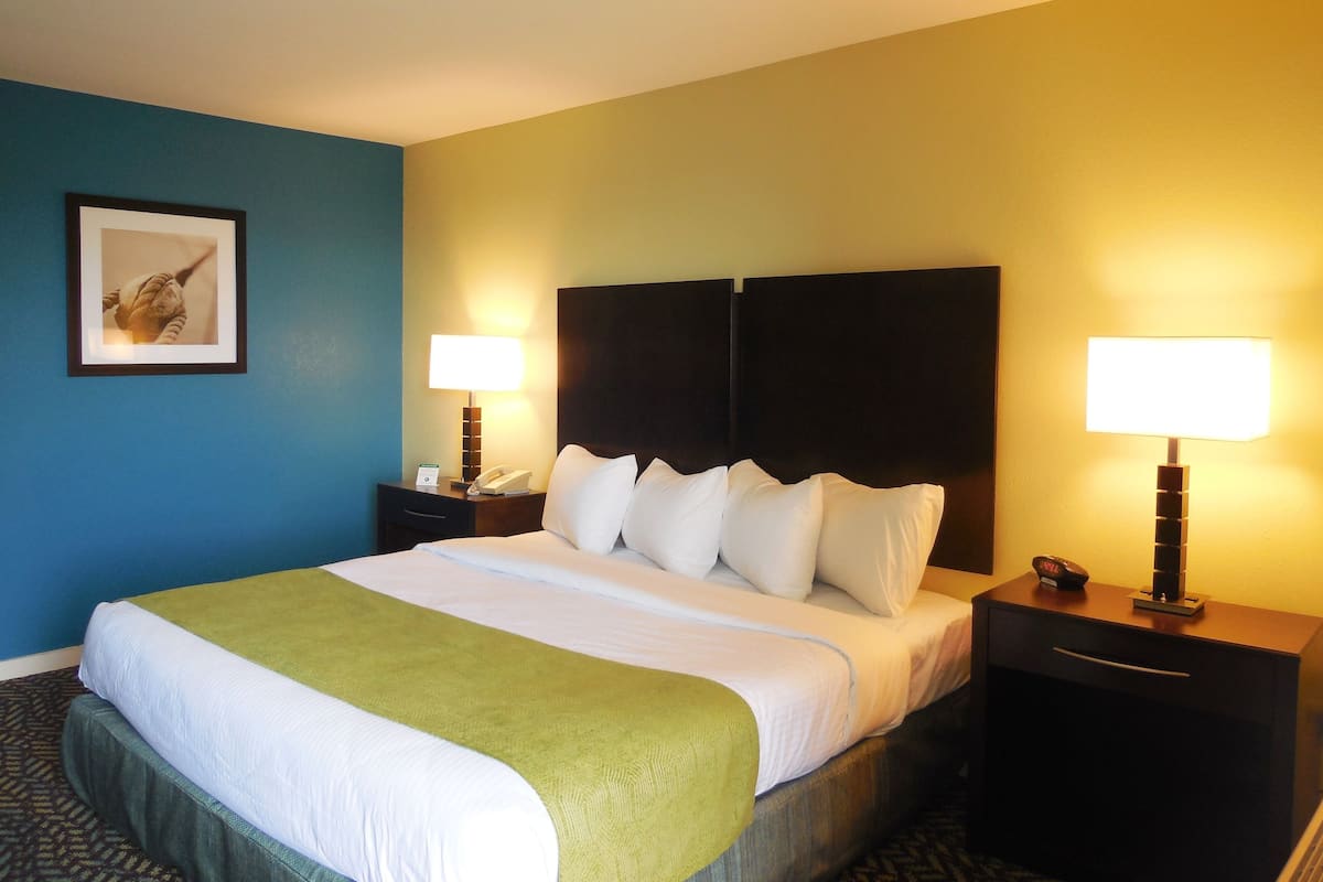 Premium bedding, desk, blackout curtains, iron/ironing board