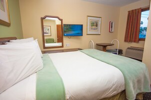 Tabla de planchar con plancha, wifi gratis y ropa de cama 