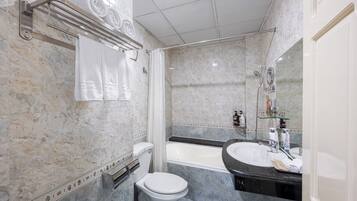 Family Triple Room | Bathroom | Shower, free toiletries, hair dryer, bathrobes