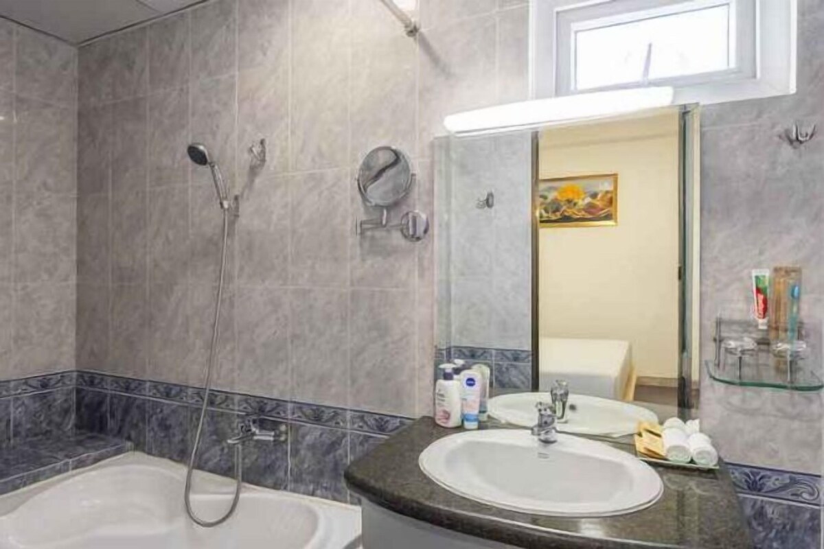 Bathroom | Shower, free toiletries, hair dryer, bathrobes