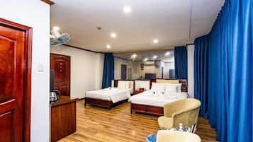 Family Room, 1 Bedroom, Air conditioning | Minibar, in-room safe, desk, blackout drapes