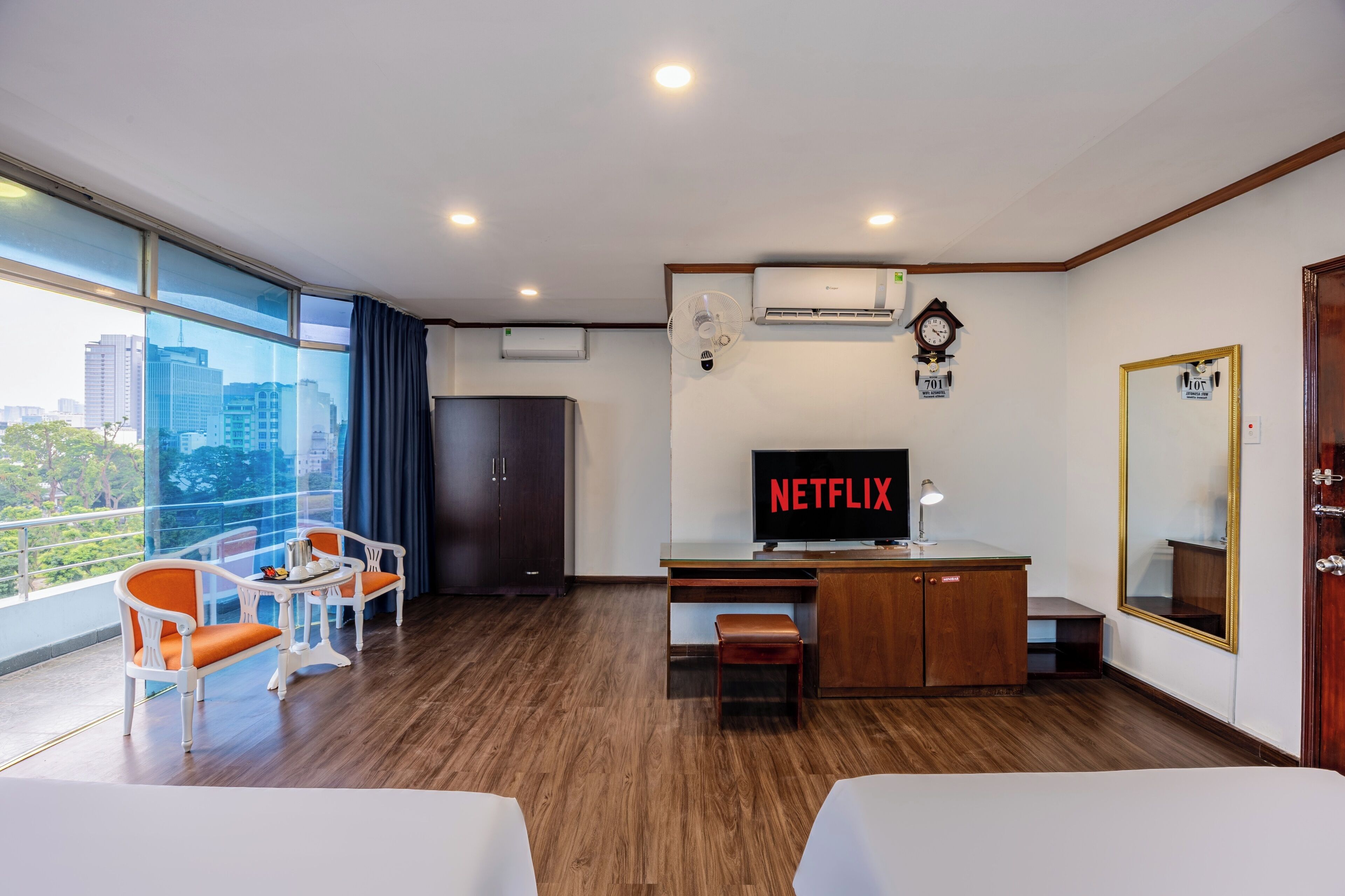 Family Room, 1 Bedroom, Air conditioning | Minibar, in-room safe, desk, blackout drapes