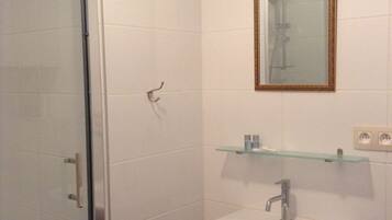 Shower, free toiletries, hair dryer, towels