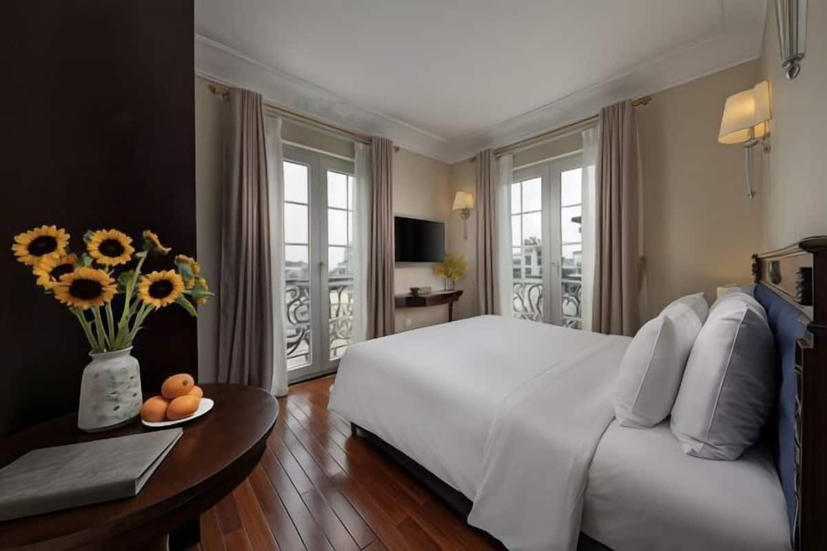 1 kamar tidur, seprai premium, minibar, dan brankas