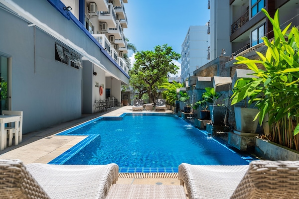 Outdoor pool, sun loungers