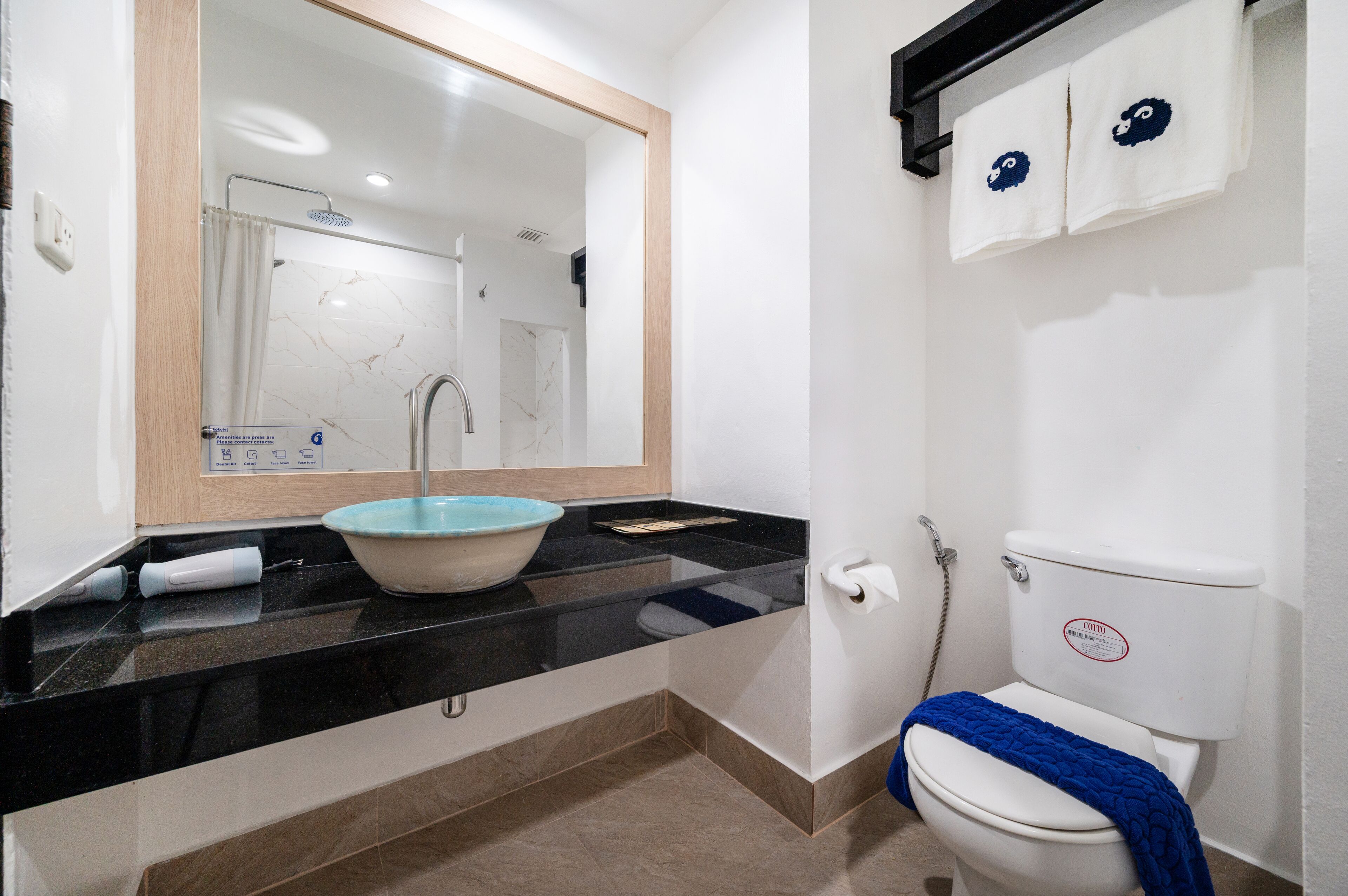 superior twin room | bathroom | shower, free toiletries, hair dryer, towels