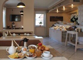 Daily buffet breakfast (EUR 14 per person)
