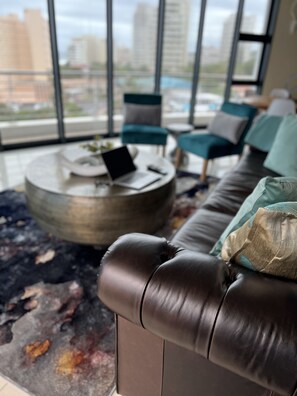 Luxury Apartment, 2 Bedrooms, Smoking, Partial Sea View | Living area | Flat-screen TV - The Pearls of Umhlanga (Umhlanga)