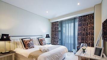 Appartement Luxe, 3 chambres, vue plage | 1 chambre, literie de qualité supérieure