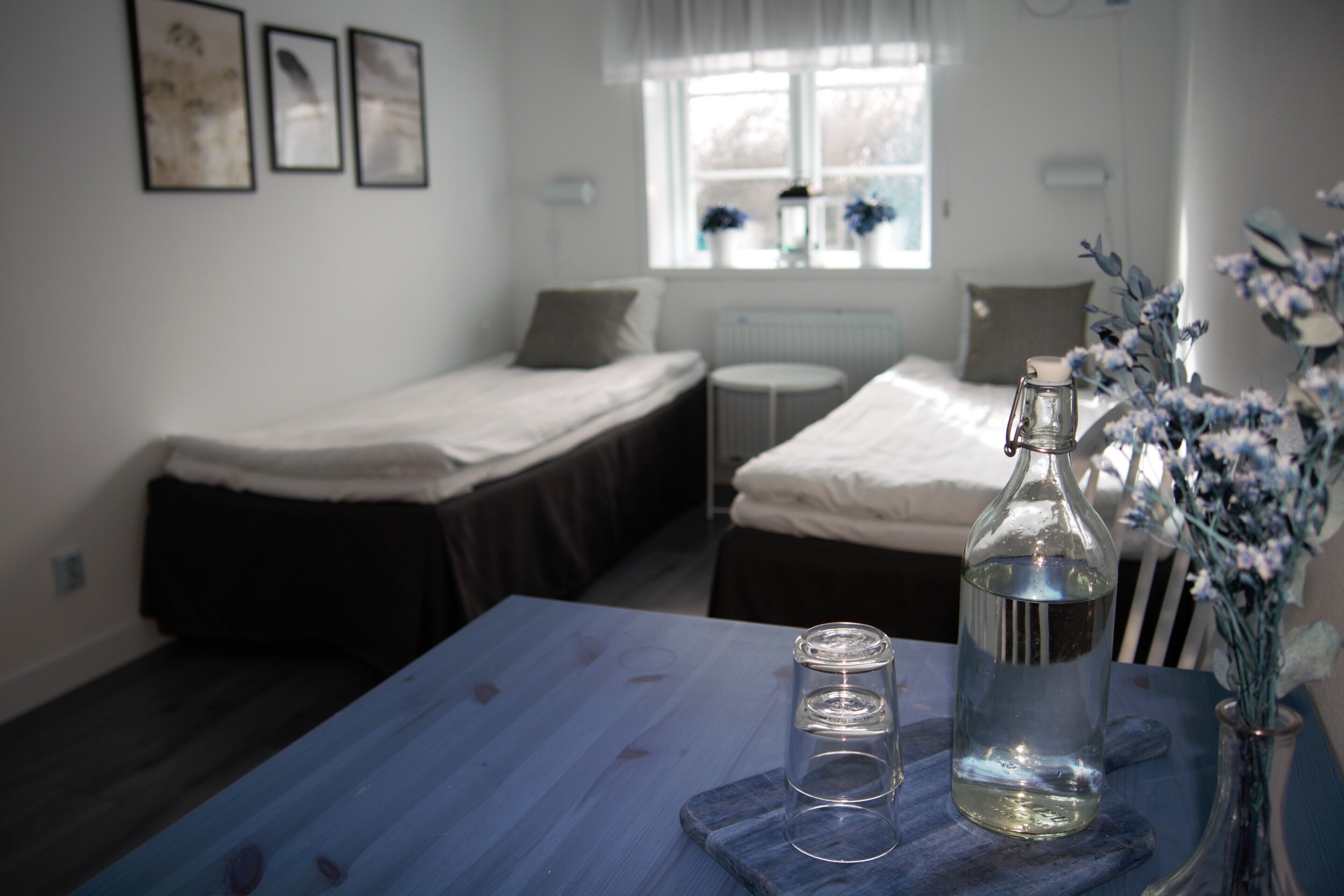 Twin Room, 2 Twin Beds, Shared Bathroom | Individually decorated, laptop workspace, blackout drapes, travel crib