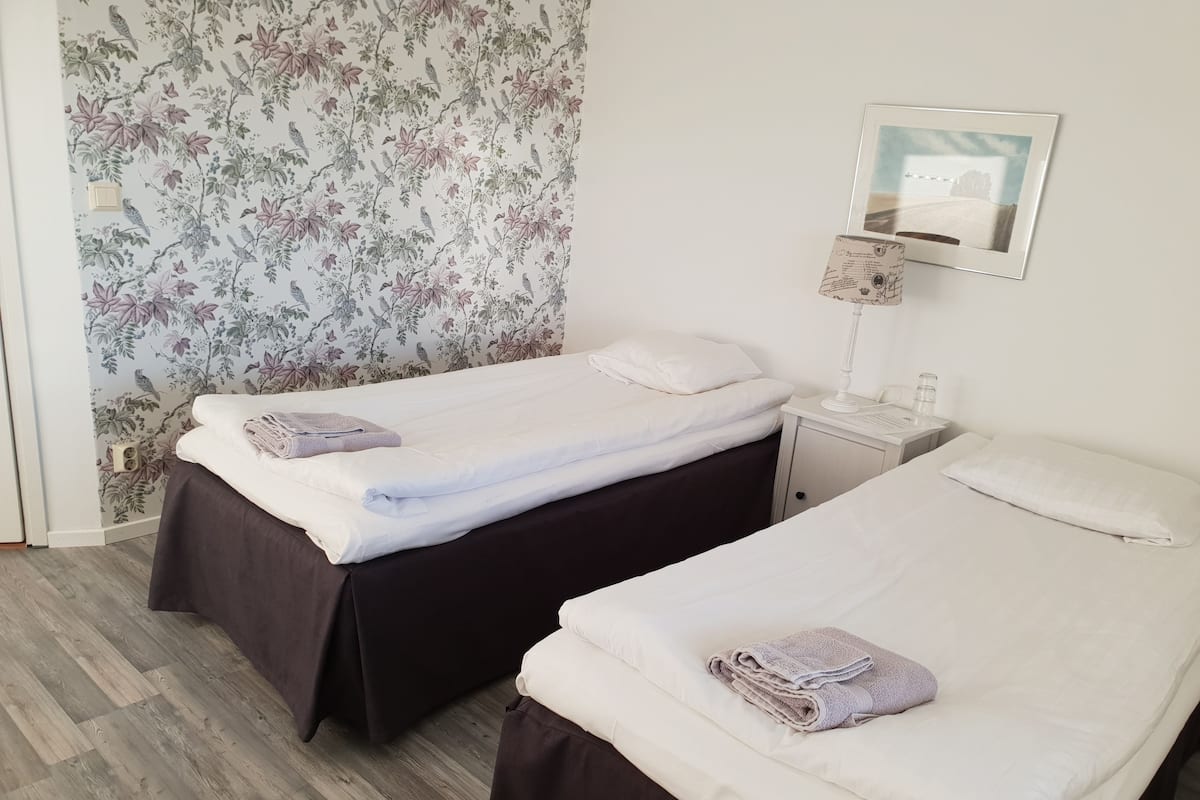 Individually decorated, laptop workspace, blackout curtains, travel cot