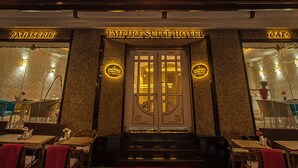 A hotel with a grand entrance, multiple floors, and ornate balconies. - Empire Suite Hotel (Istanbul)