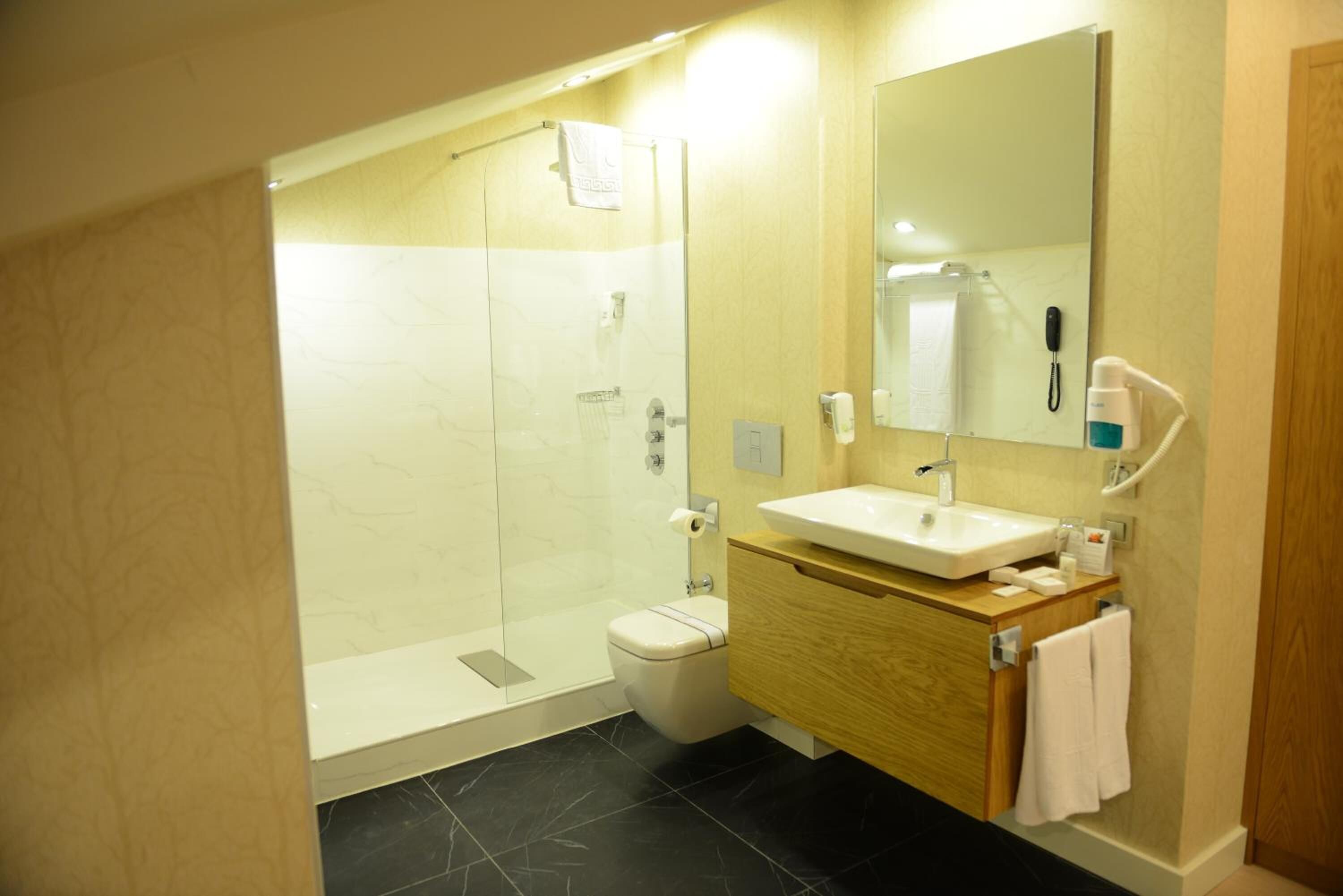 free toiletries, hair dryer, bathrobes, slippers