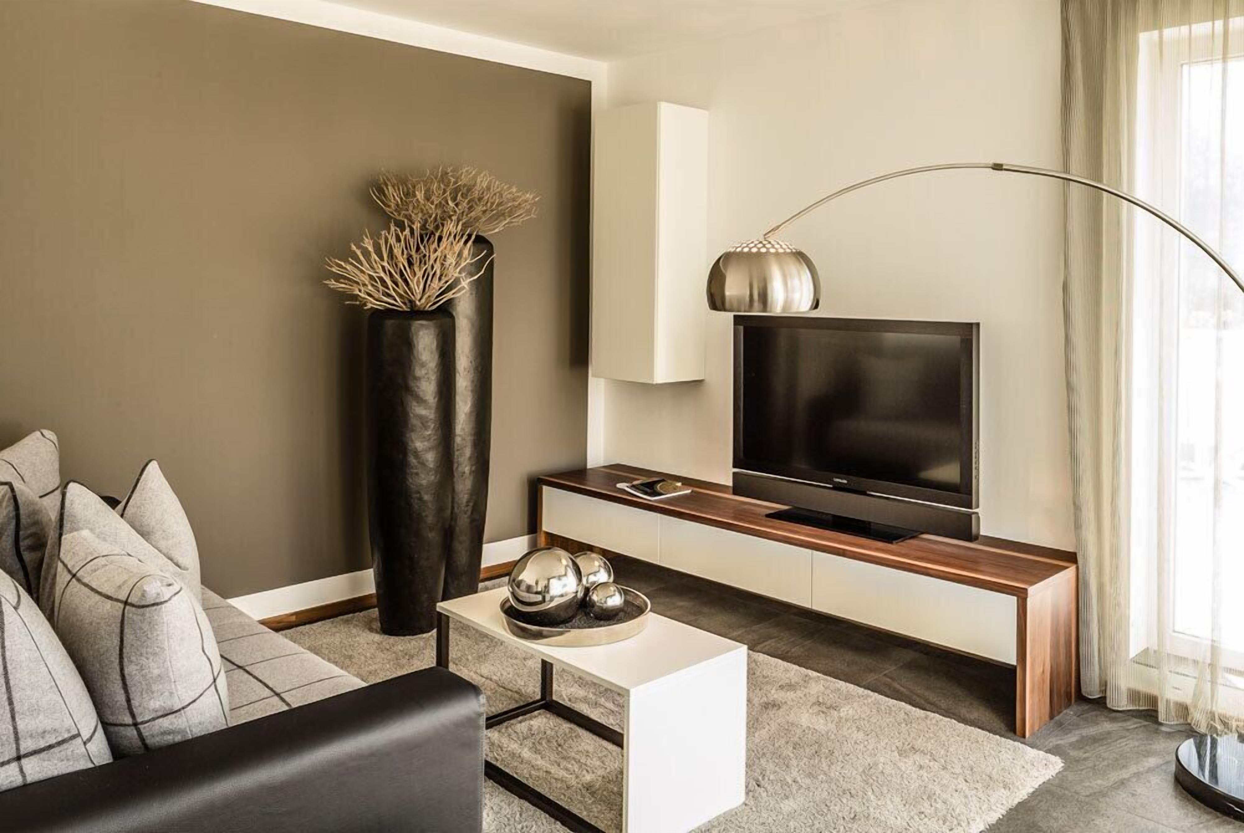 Suite, en el área del jardín | 1 habitación, caja de seguridad en la habitación y escritorio 