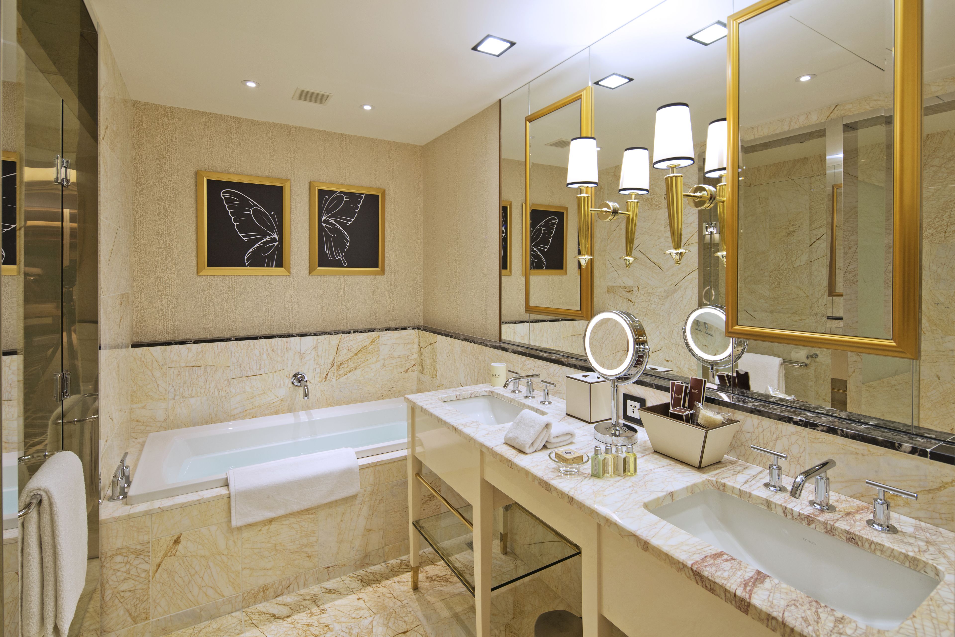 separate bathtub and shower, hair dryer, slippers, towels