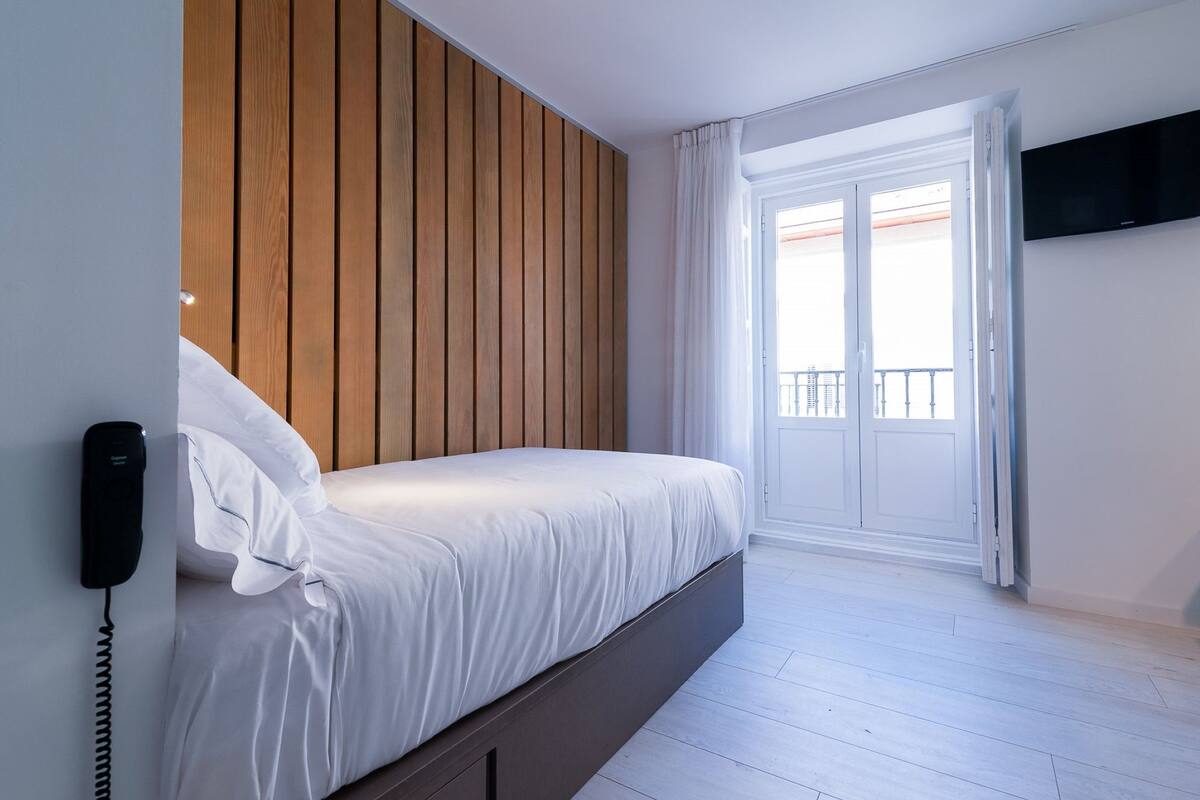 47-inch flat-screen TV with satellite channels, TV