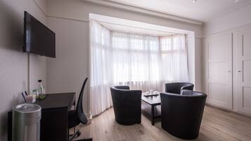 Deluxe Villa, 2 Bedrooms, Private Bathroom, Garden View | Living area | Flat-screen TV, first-run movies