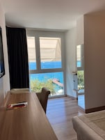 Junior Suite, Lake View | Minibar, in-room safe, blackout drapes, soundproofing