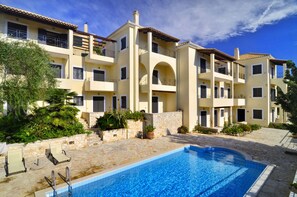 Seasonal outdoor pool, pool umbrellas, sun loungers