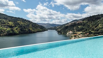 Indoor pool, seasonal outdoor pool, pool umbrellas, sun loungers