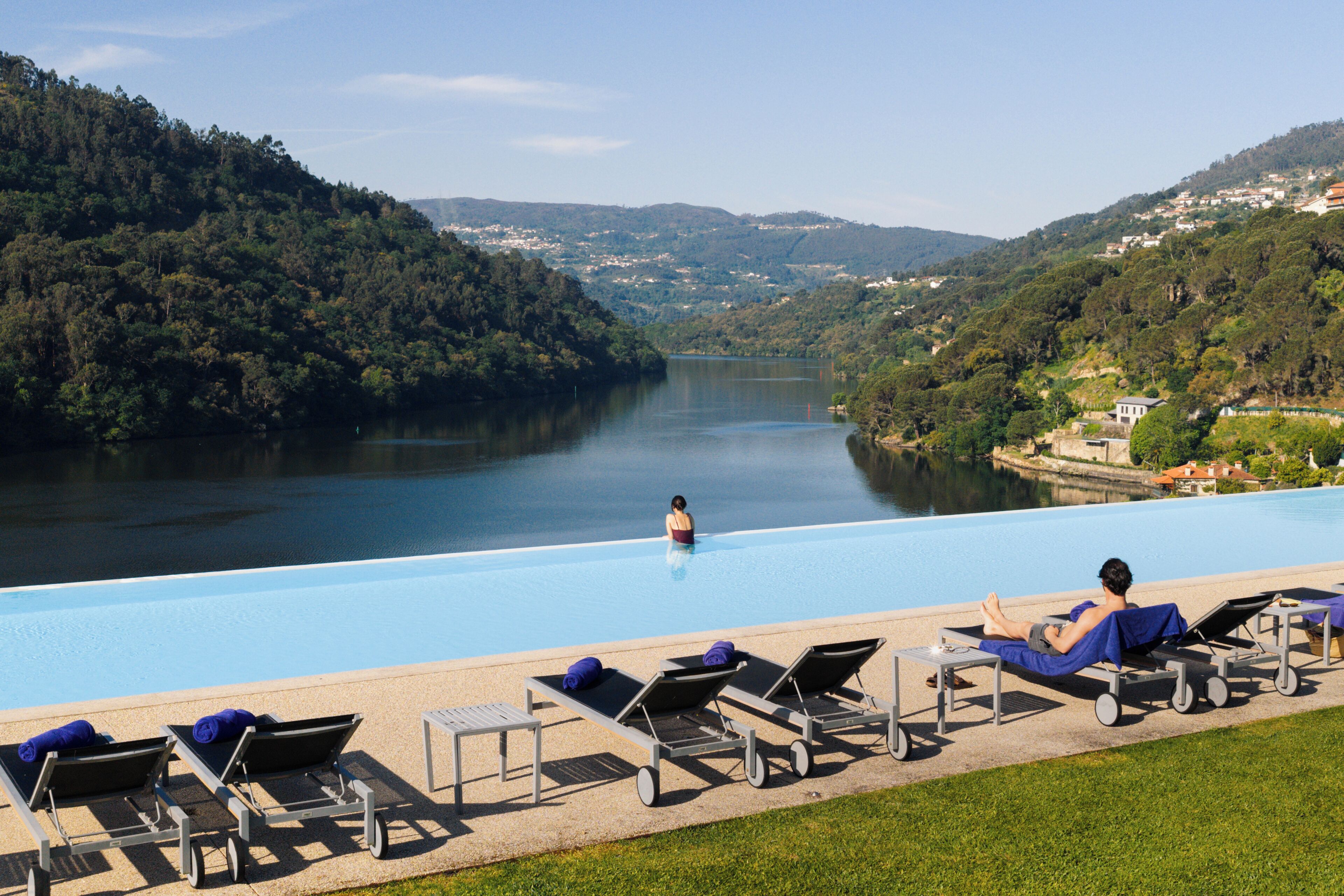 Indoor pool, seasonal outdoor pool, pool umbrellas, pool loungers