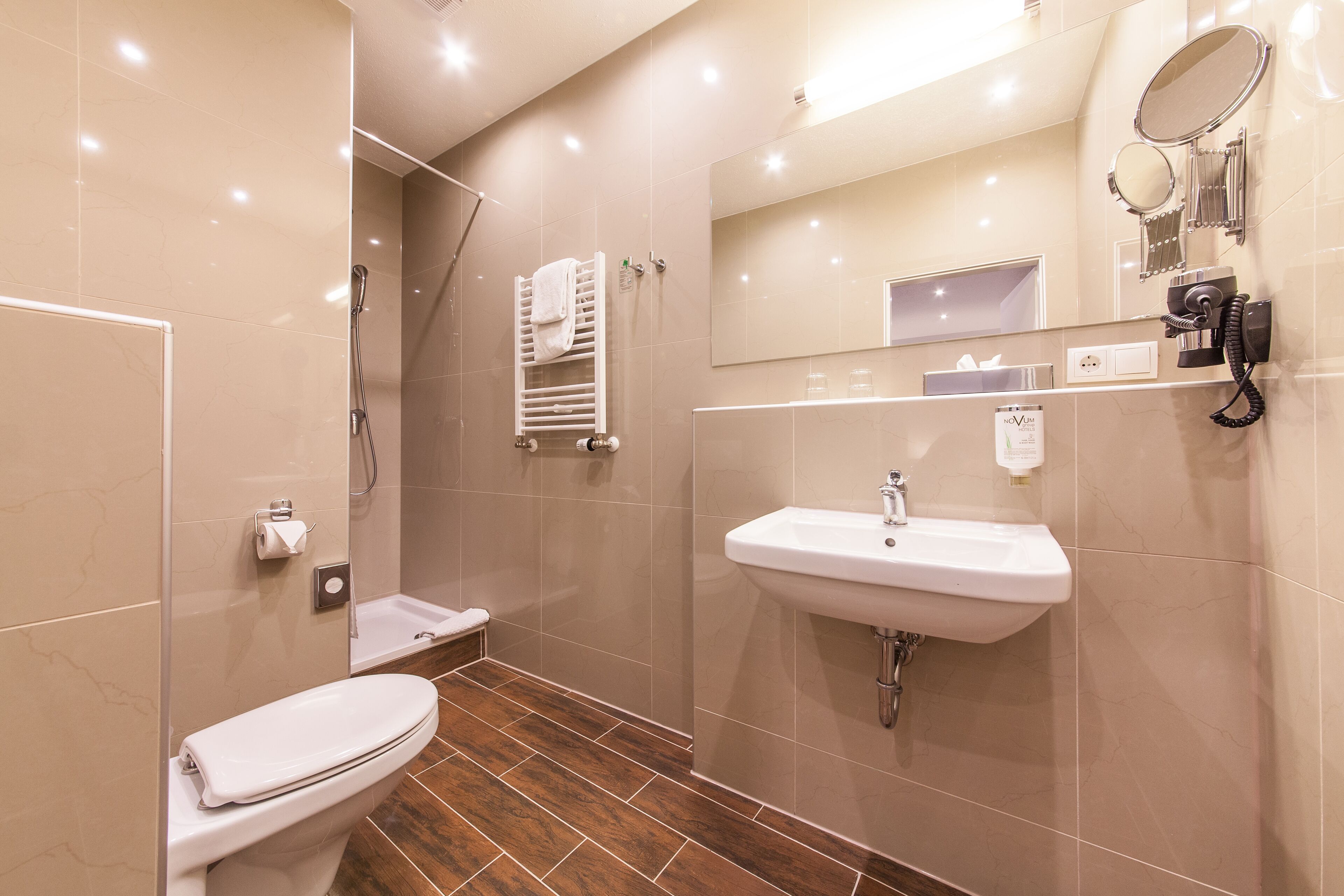 shower, free toiletries, hair dryer, towels