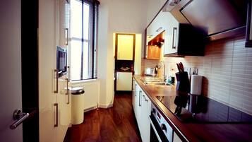 Luxury Apartment, 1 Bedroom, City View | Private kitchen | Full-size fridge, microwave, stovetop, dishwasher