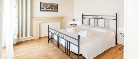 Family Apartment, 1 Bedroom | Blackout drapes, iron/ironing board, free WiFi, bed sheets