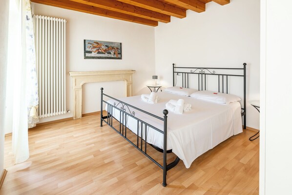 Family Apartment, 1 Bedroom | Blackout drapes, iron/ironing board, free WiFi, bed sheets