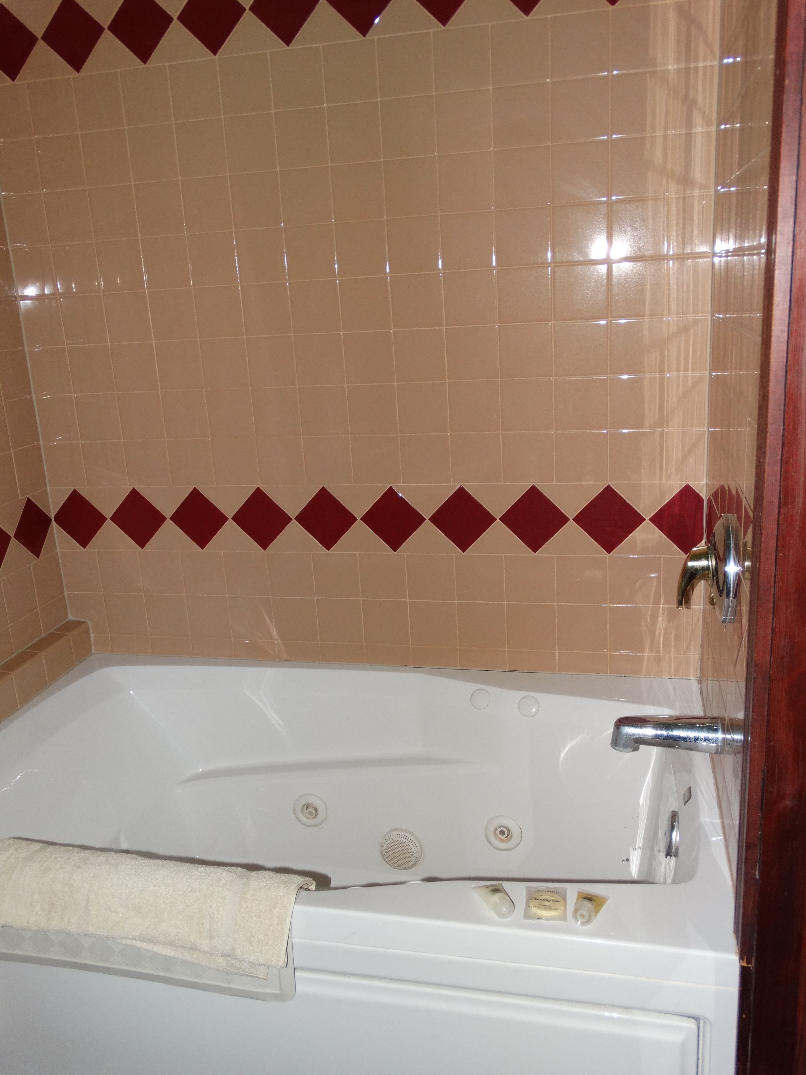 suite, 1 king bed, jetted tub | jetted bathtub