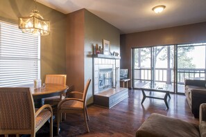 Panoramic Condo, 1 Bedroom, Mountain View, Mountainside | Living room | 32-inch flat-screen TV with cable channels, TV, fireplace