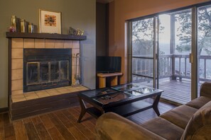 Panoramic Condo, 1 Bedroom, Mountain View, Mountainside | Living room | 32-inch flat-screen TV with cable channels, TV, fireplace
