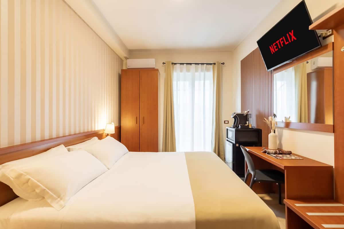 Double or Twin Room, Balcony, City View | In-room safe, desk, free WiFi