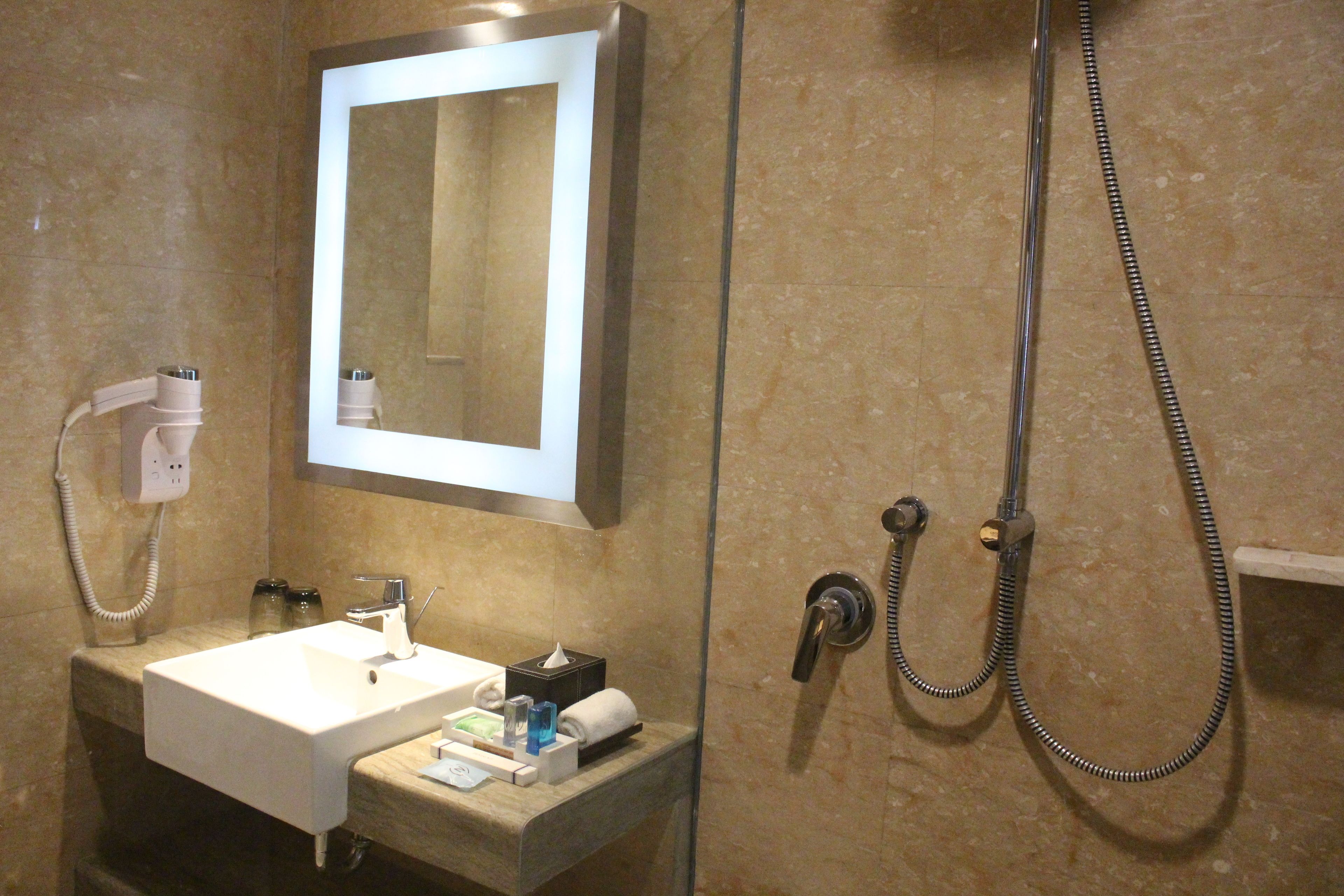 shower, eco-friendly toiletries, hair dryer, slippers