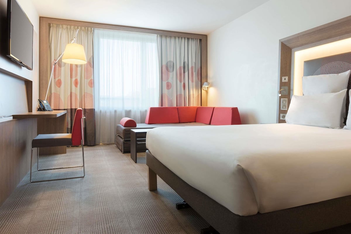 Habitación superior, 1 cama matrimonial y sofá cama | Ropa de cama de alta calidad y minibar