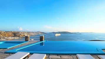 3 piscinas al aire libre, sillones reclinables de piscina