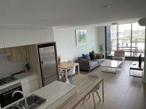 Deluxe Apartment, 2 Bedrooms, River View | Living area - Link Portside Wharf Apartment Hotel (Hamilton)