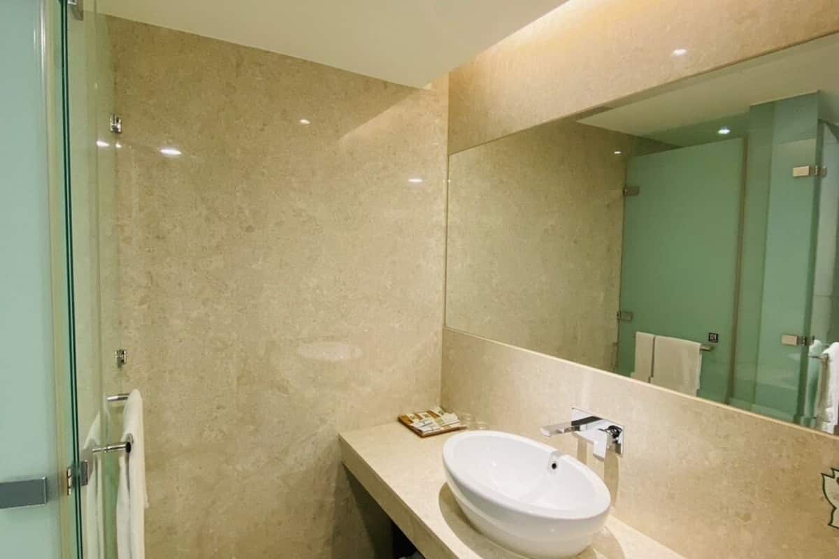 shower, rainfall showerhead, designer toiletries, hair dryer