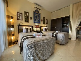 Desk, laptop workspace, bed sheets