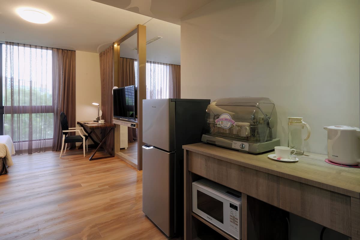 executive triple room, 3 single beds | living area | led tv, table football, ping pong