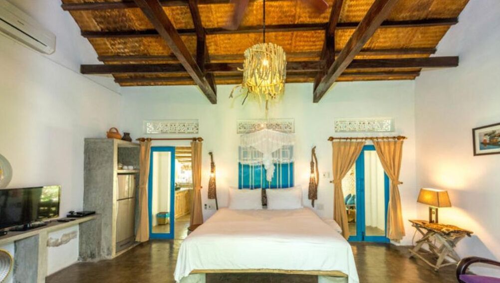 villa, partial sea view (sunset) | minibar, in-room safe, desk, free wifi