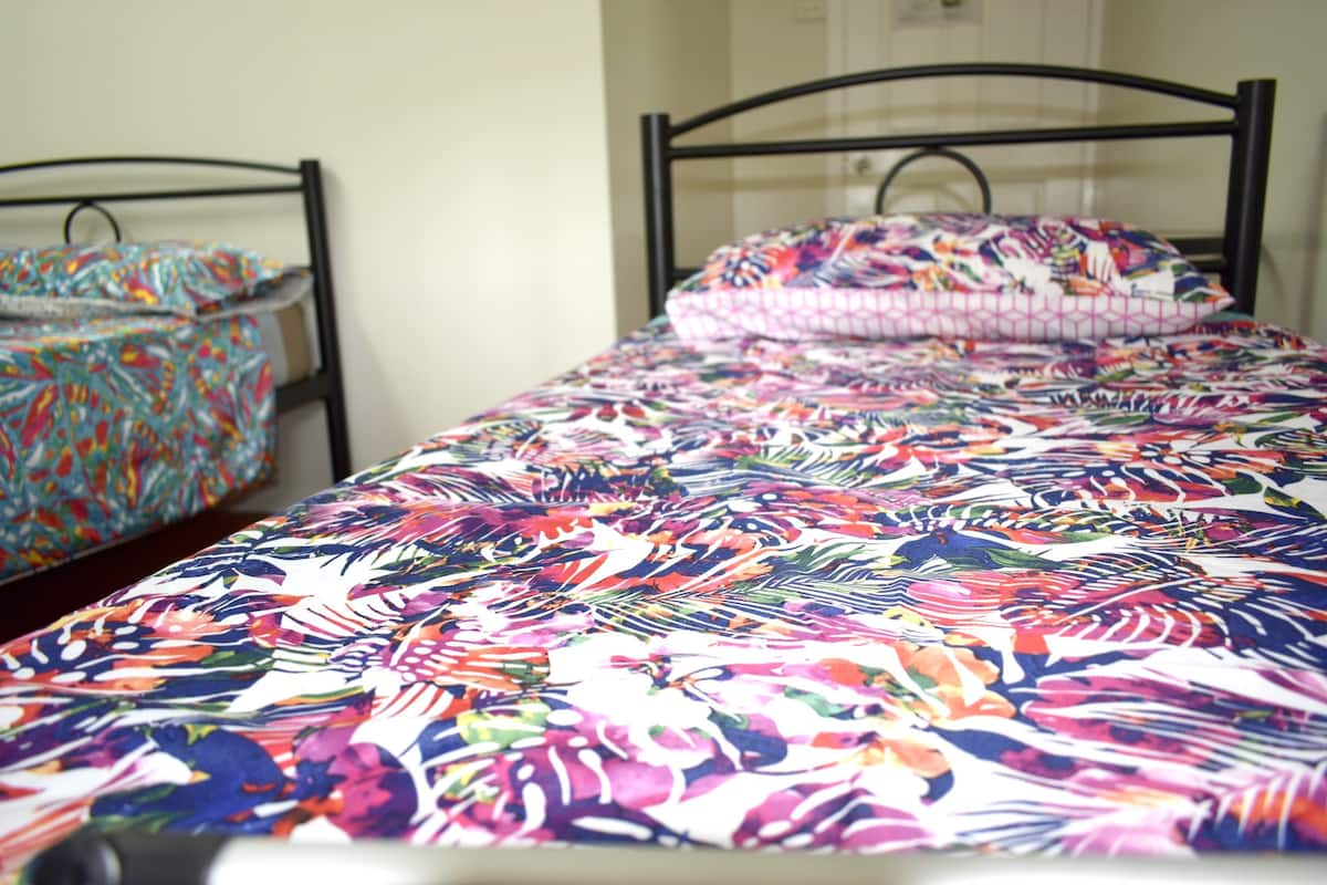 Chambre Triple Deluxe, plusieurs lits, vue jardin
