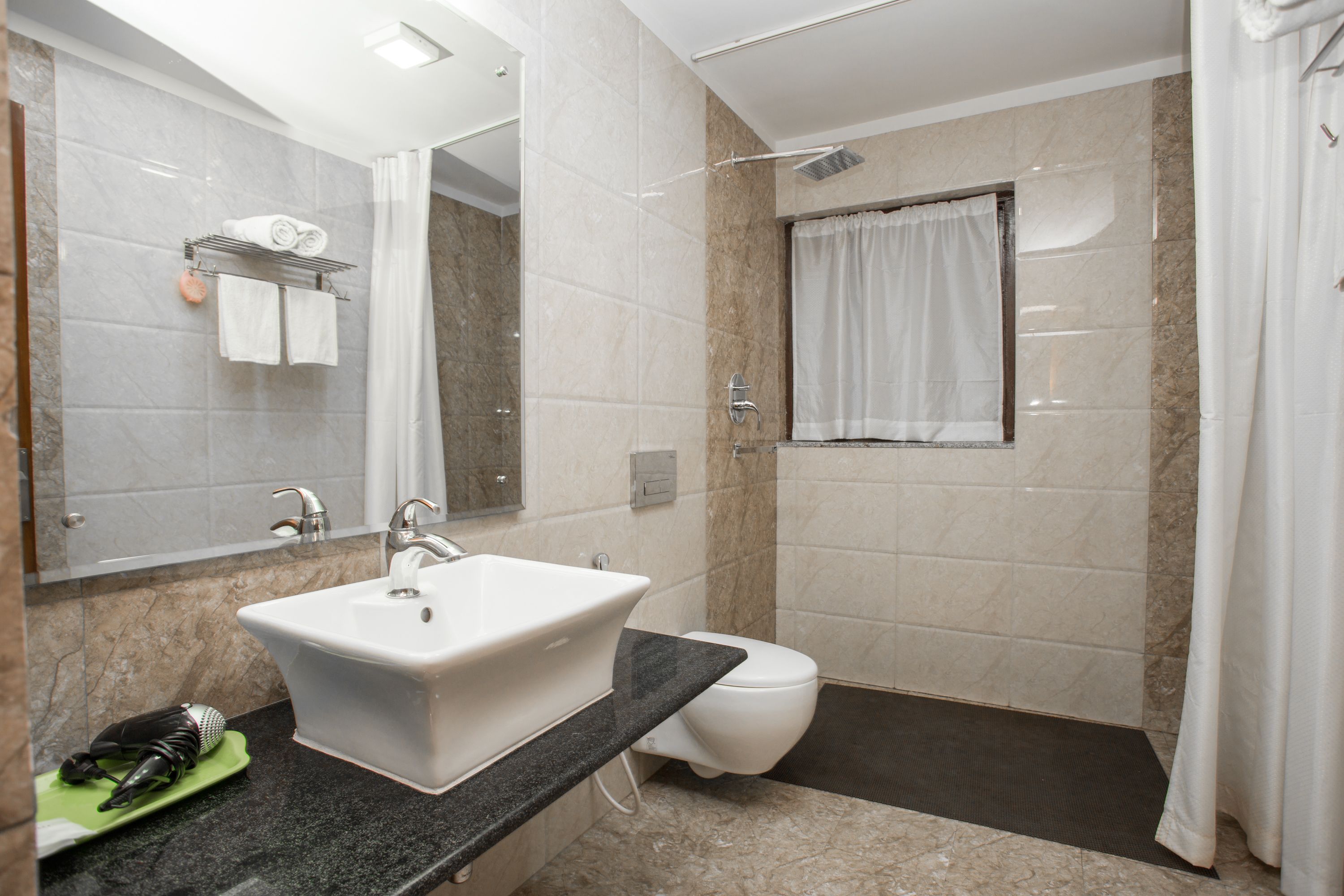 shower, free toiletries, hair dryer, slippers