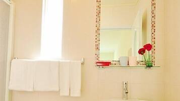 Shower, free toiletries, hair dryer, slippers