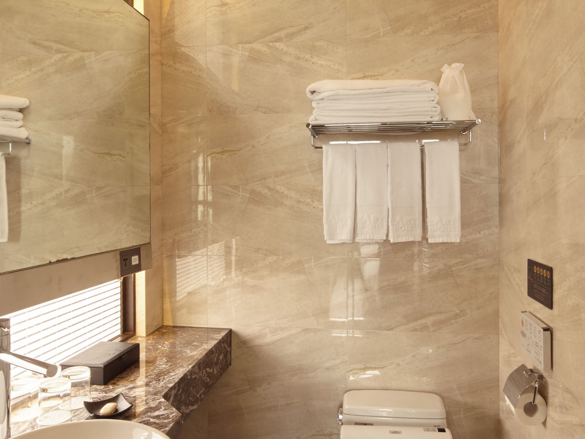 shower, hydromassage showerhead, designer toiletries, hair dryer