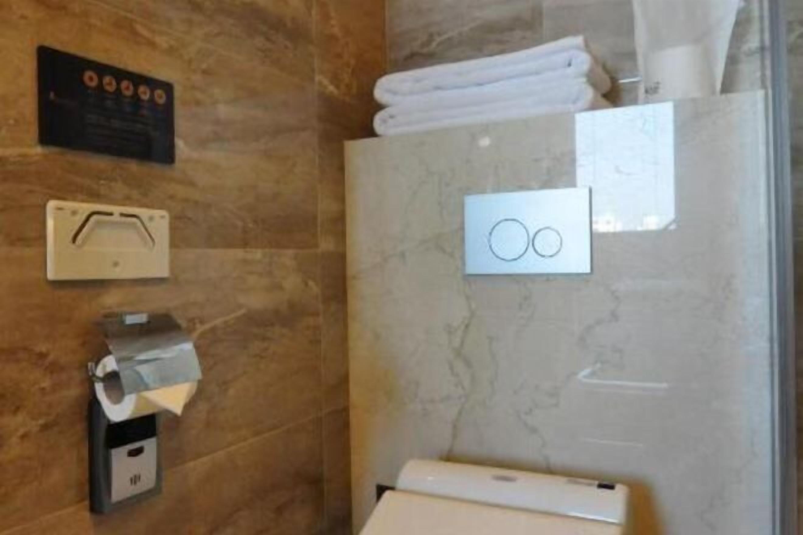 Bathroom | Shower, hydromassage showerhead, designer toiletries, hair dryer